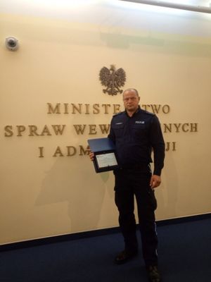 St asp. Marcin Staszak na tle MSWiA.